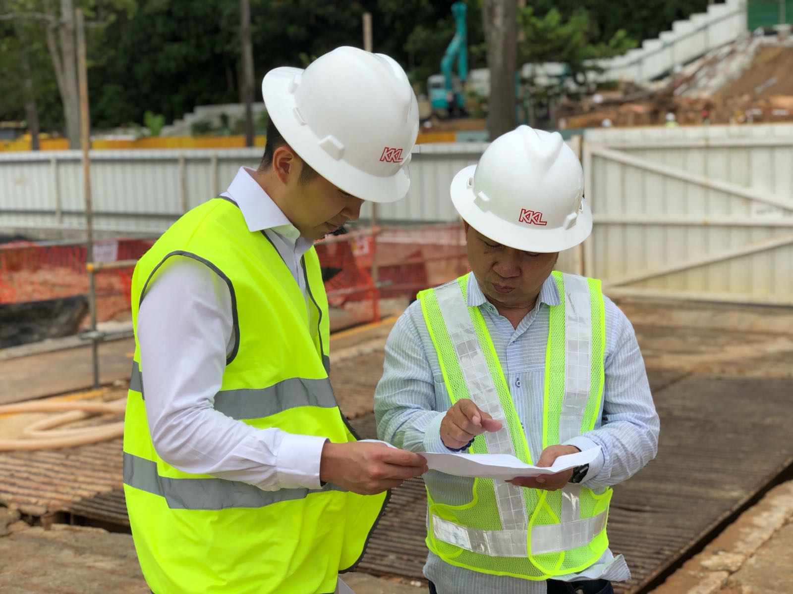 KKL Managers Reviewing Project Plan